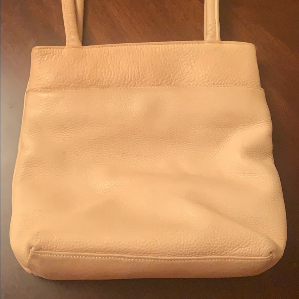Tan nine west bag.